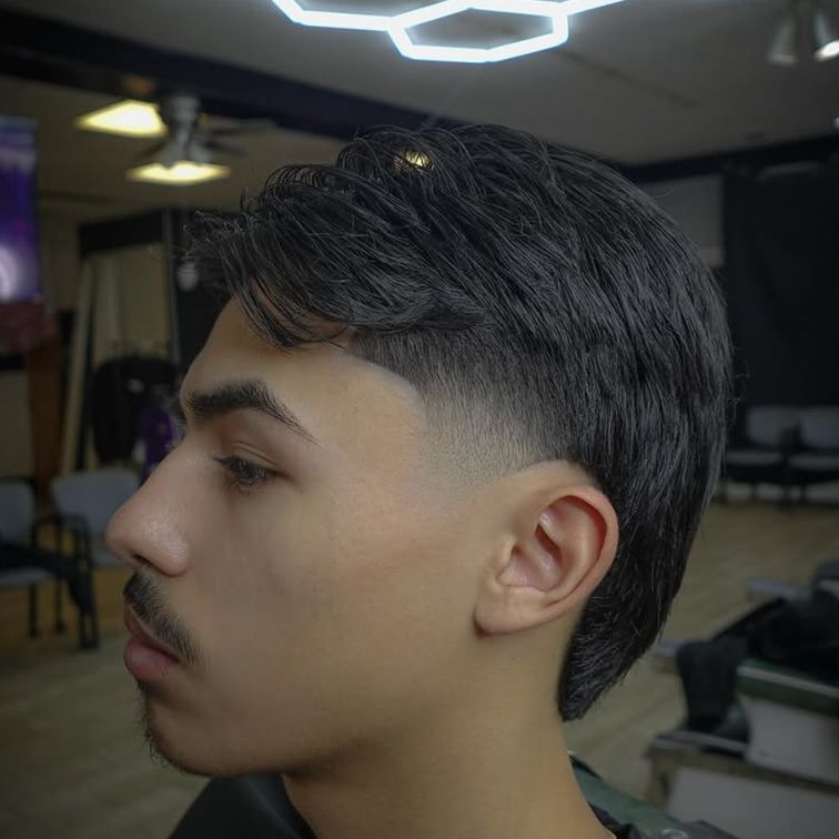man with a new barber cut