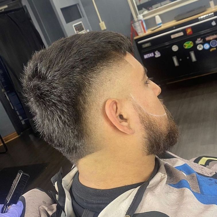 backside of a man with a new cut